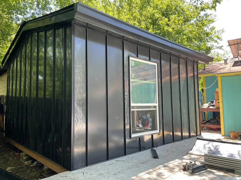 Black standing seam metal wall panels for Metal Roof Installation in Micco